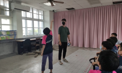 圖九、學生團隊志工於培訓課程帶領學童認識無人機避障功能